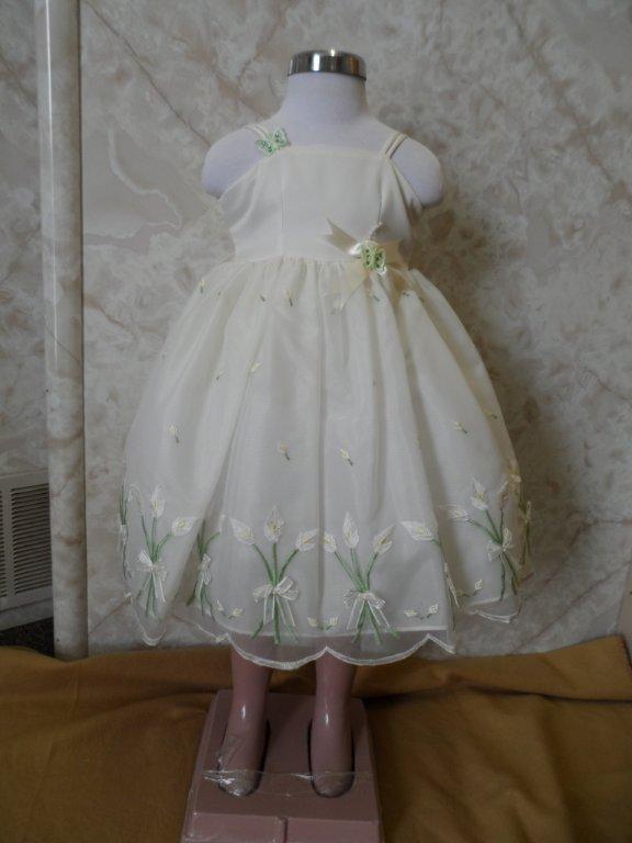 ivory dress with green stems and yellow flowers