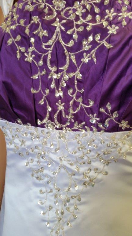 white and purple wedding gown