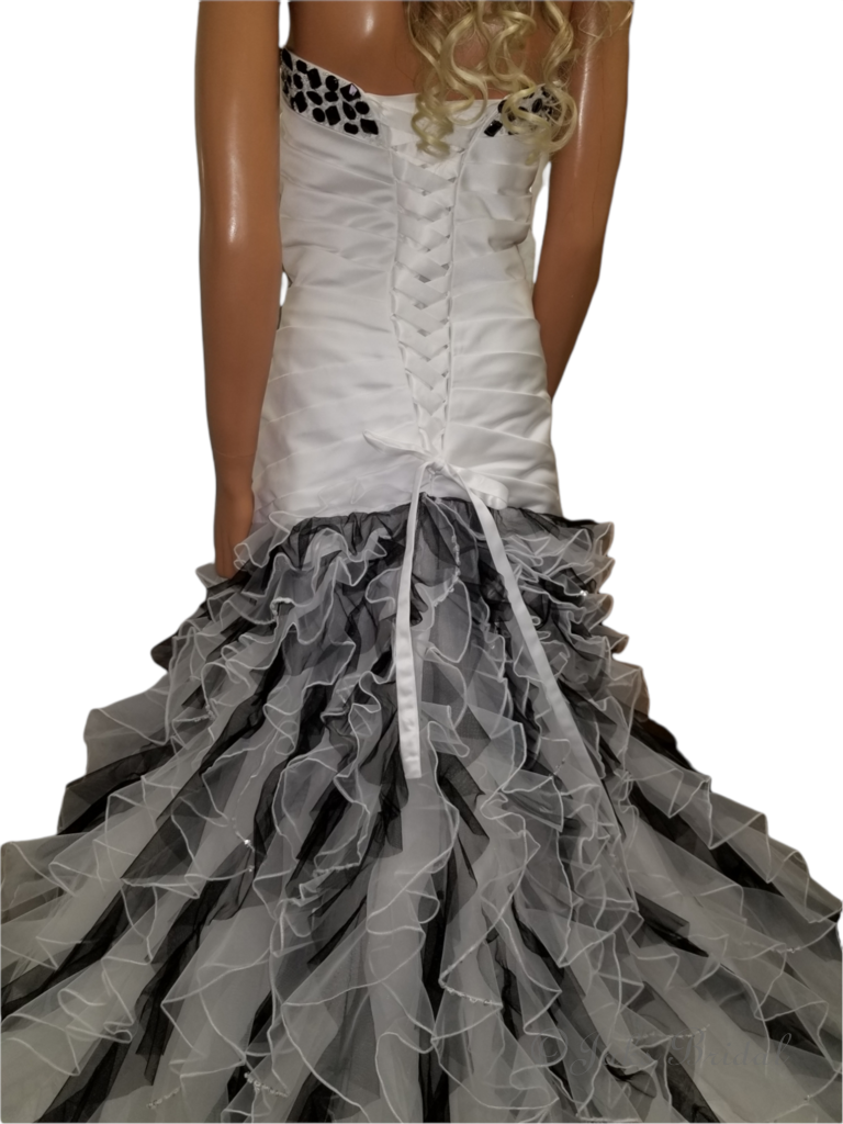 ivory wedding dress with black beading and ruffles
