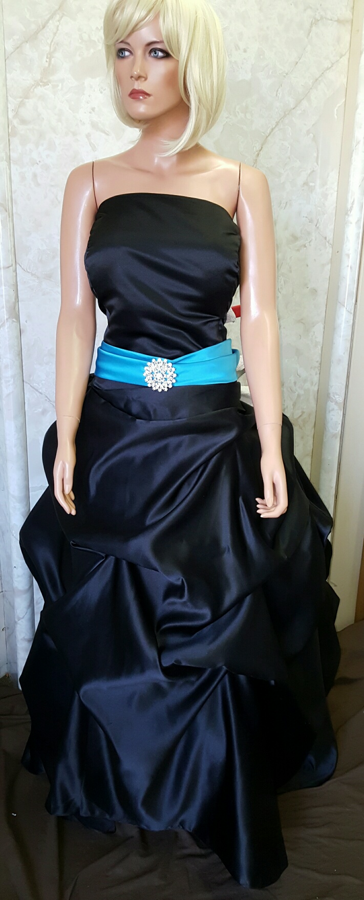 Black dress with turquoise sash
