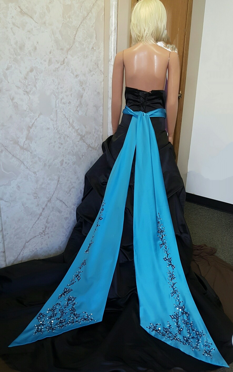 Black and turquoise gown