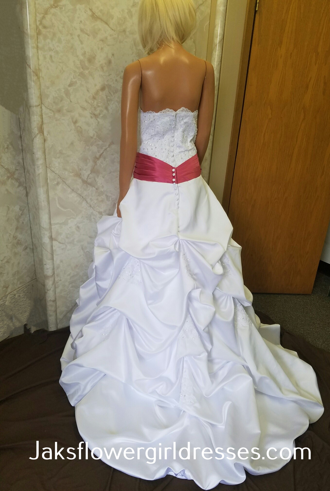 white wedding dress with watermelon sash