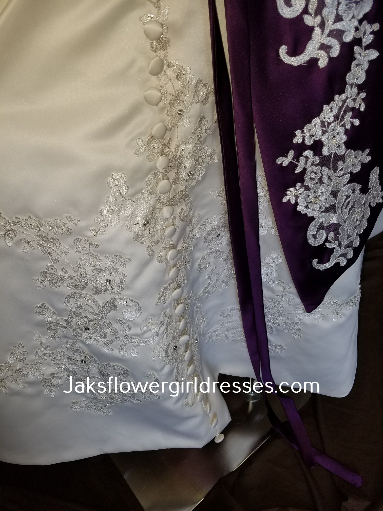 wedding dress high low skirt and purple sash