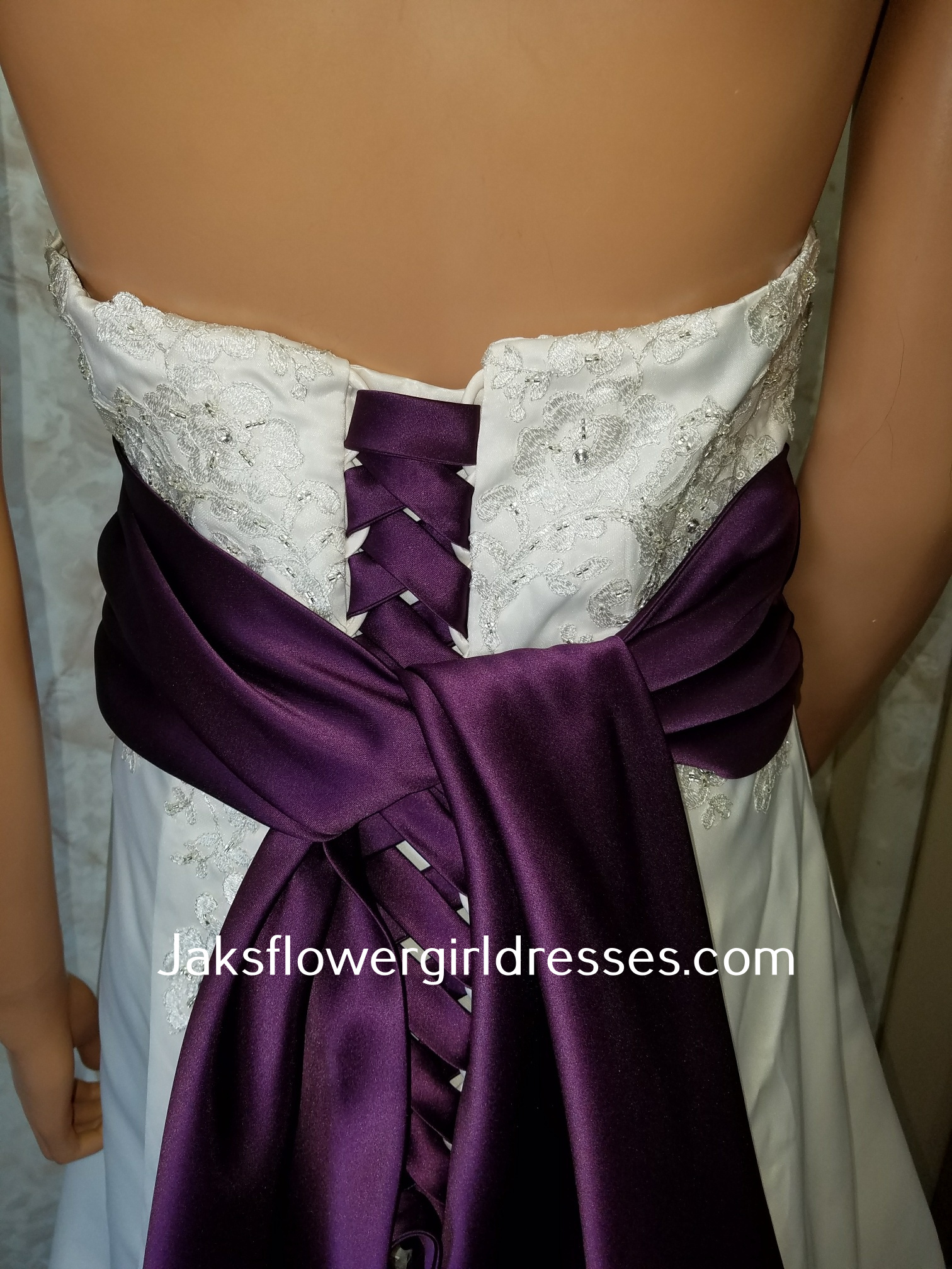wedding dress high low skirt and purple sash