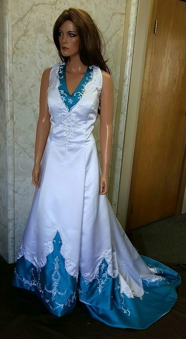 white and turquoise wedding gown