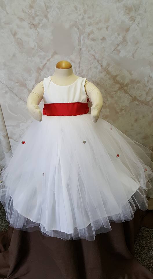 white dress with red sash