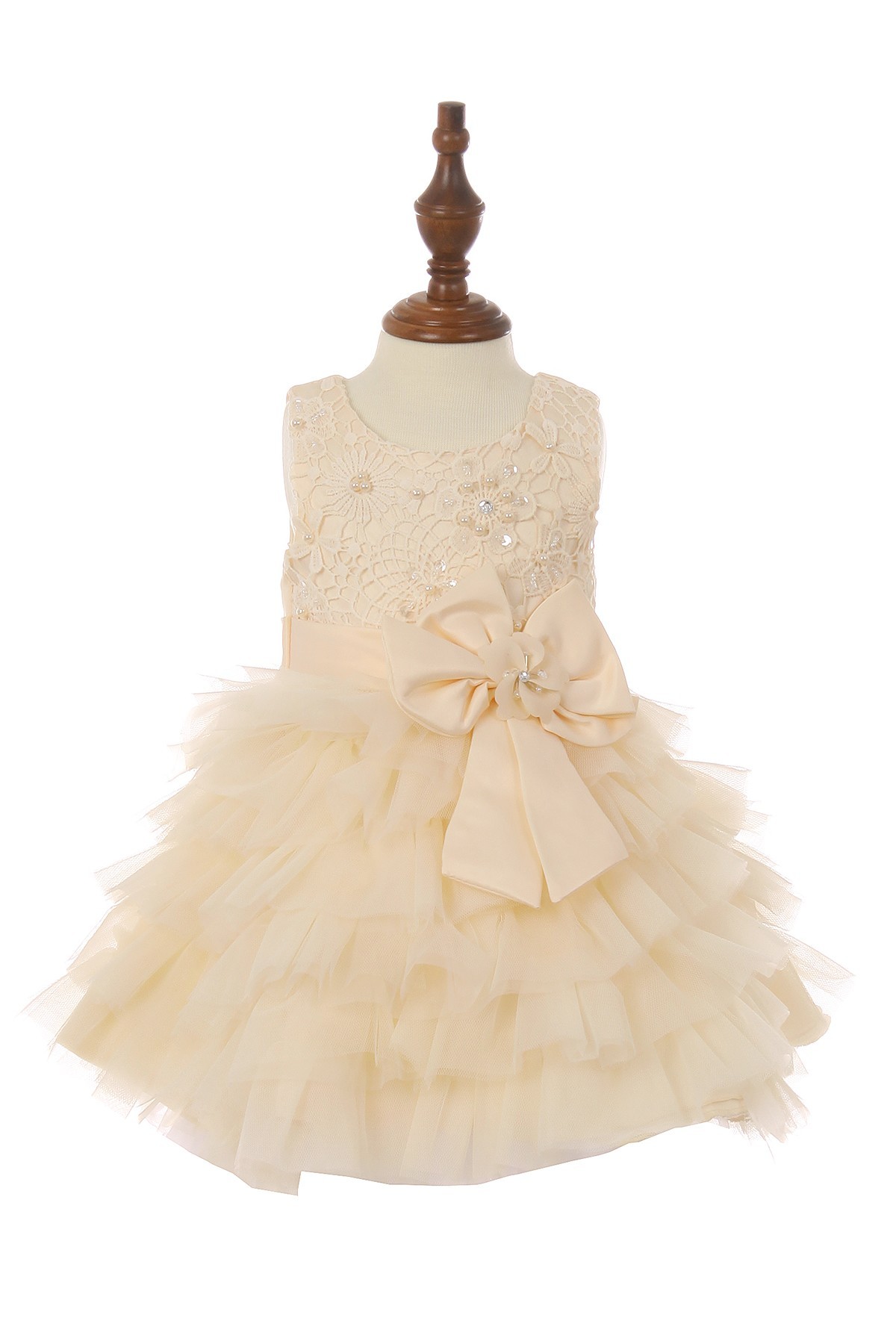 Baby dress with bow, and rows of ruffles
