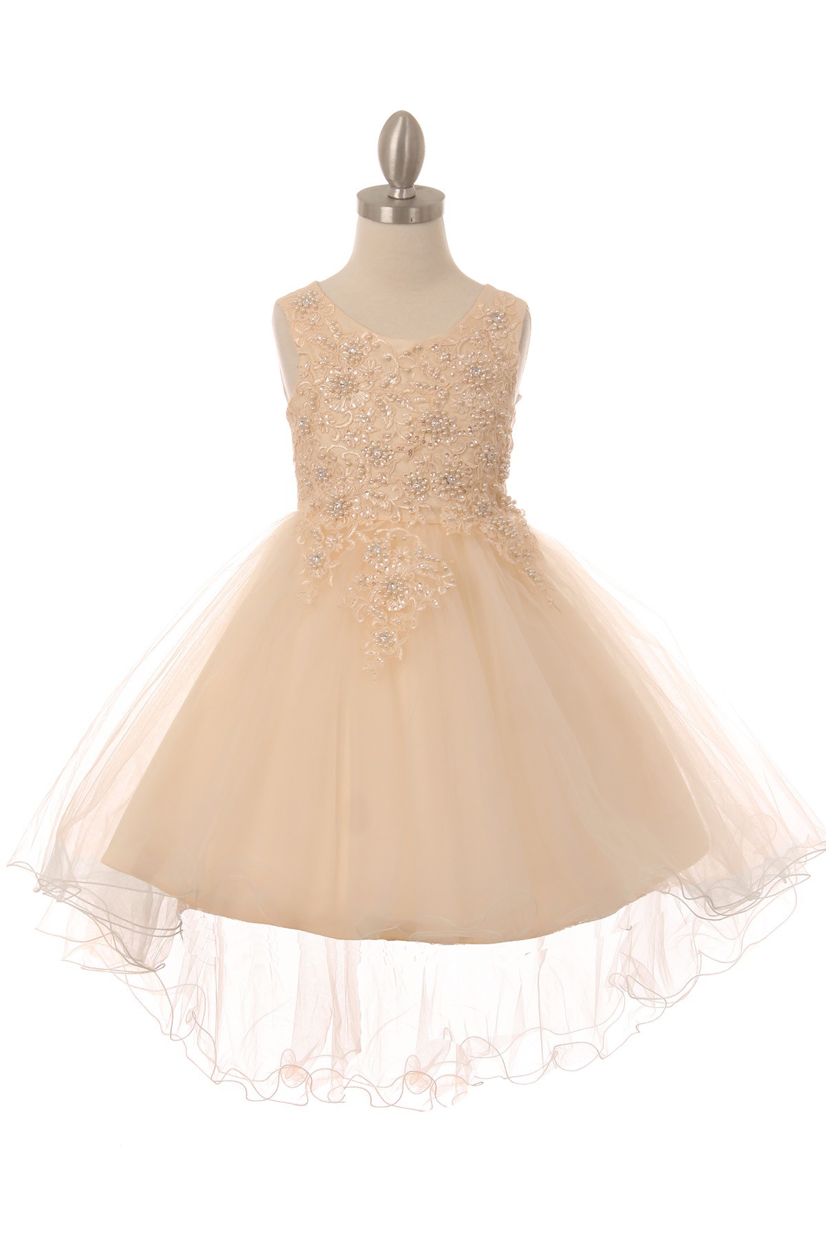 Sleeveless champagne tulle and lace dress, with pearls and sparkling rhinestones, and wired hem.