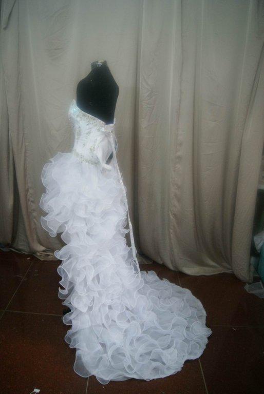 Sweetheart high low wedding dress with ruffled skirt