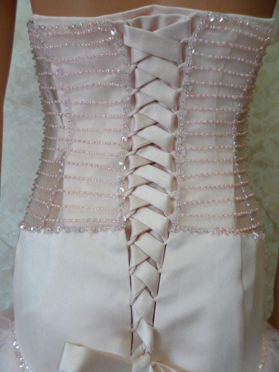 beaded see through bodice enhanced with corset back