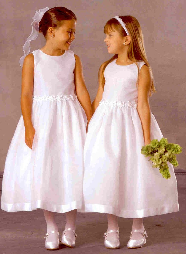 Sleeveless dress with tea length skirt