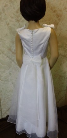 flower girl dress with bows on her shoulders