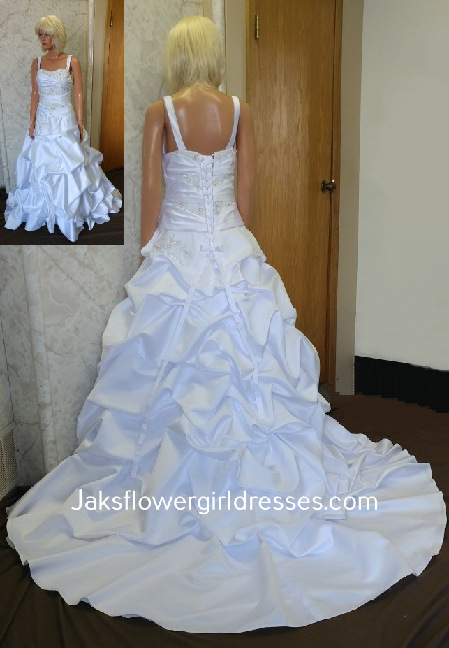 White satin wedding dress and matching flower girl dress