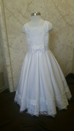 White satin and lace miniature bride dress with bow waist. On sale for $50