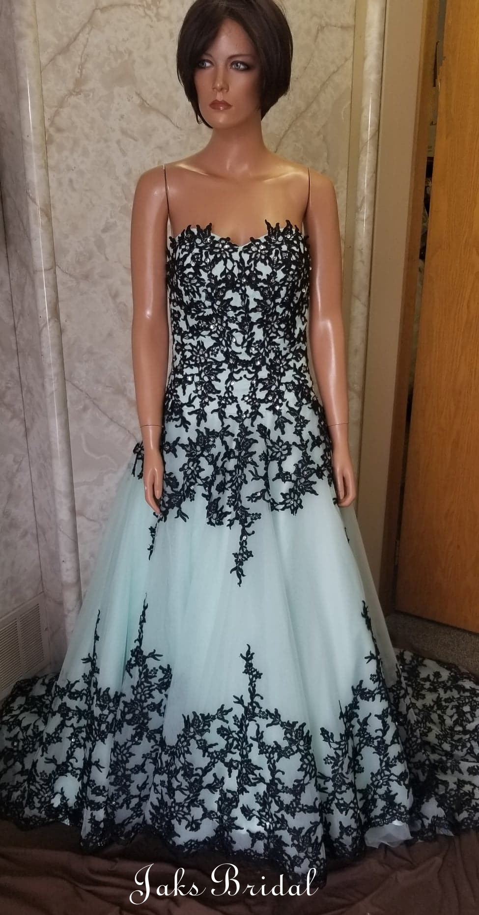 mint prom gown with black lace