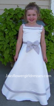 Ivory and taupe, size 5, Spaghetti Strap Satin A-Line dress with full skirt with contrasting bow 