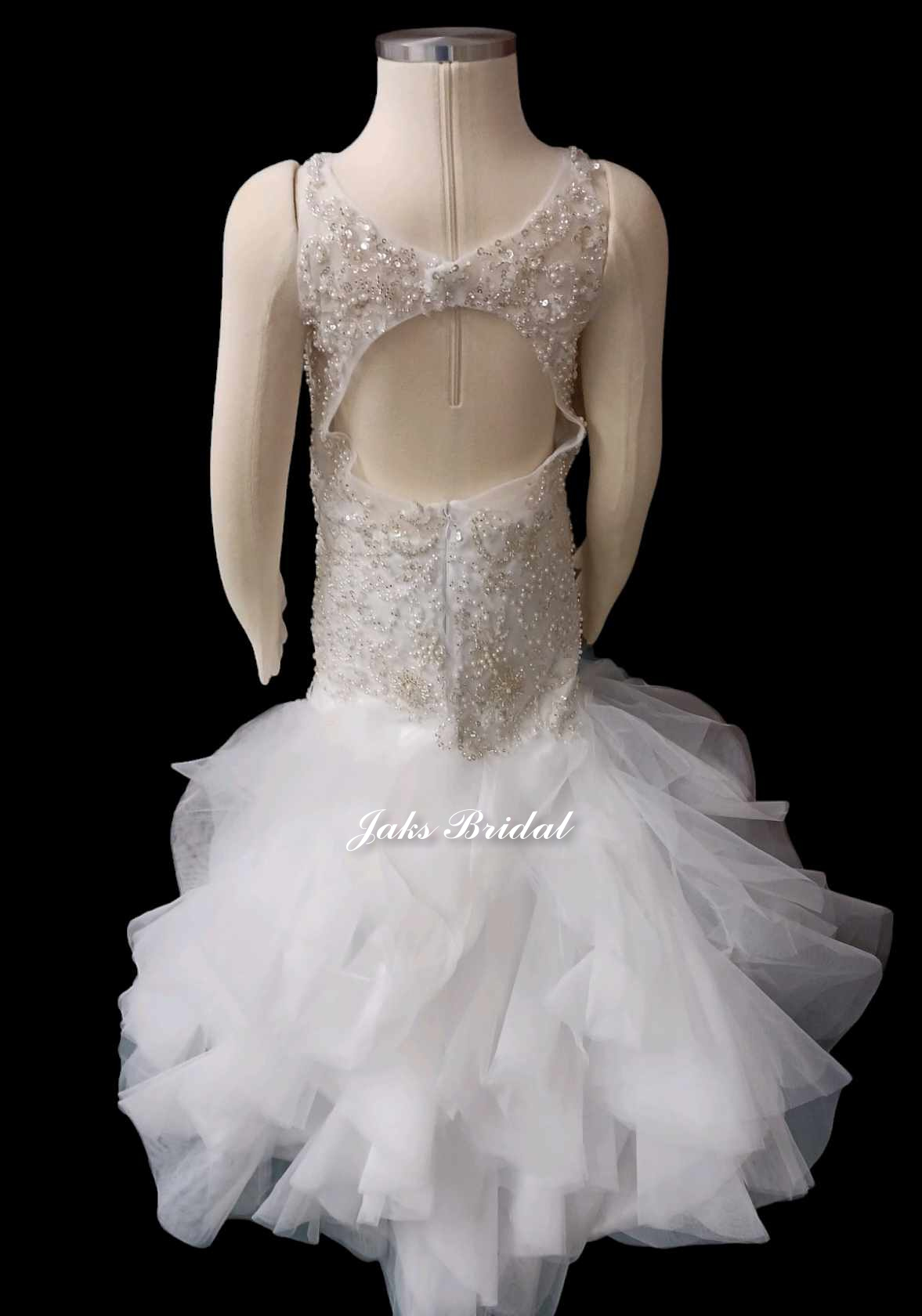 Stunning heavily beaded illusion tank-style gown with dropped waist, tiered tulle skirt, and open back