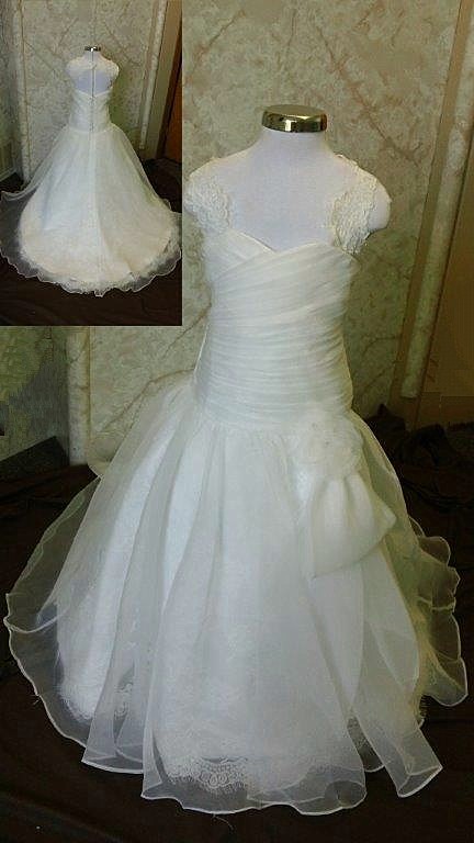 ruched gown with large flower accent
