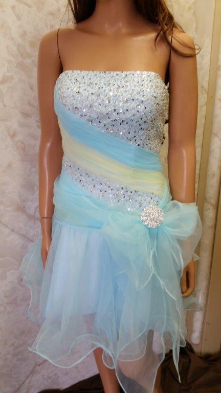 Prom dress with detachable skirt.