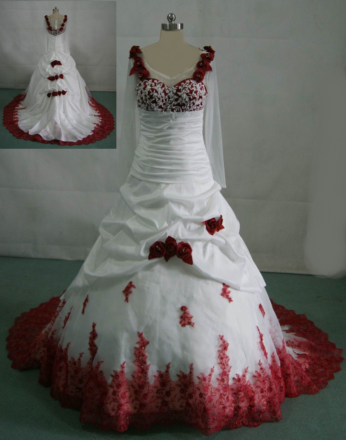 White wedding gown with red roses on the dress.