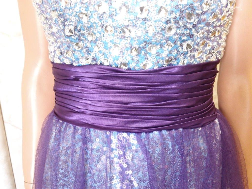 purple ruched waistline on sequin prom dress