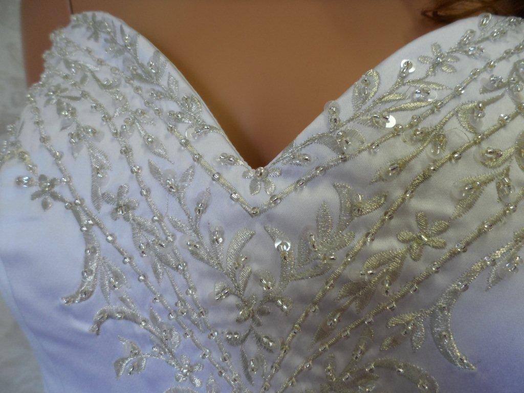 Sweetheart bodice is heavily embroidery embellished 