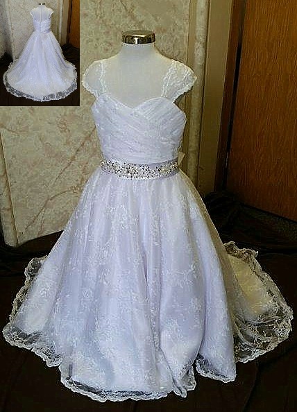 white lace flower girl dress with beaded sash