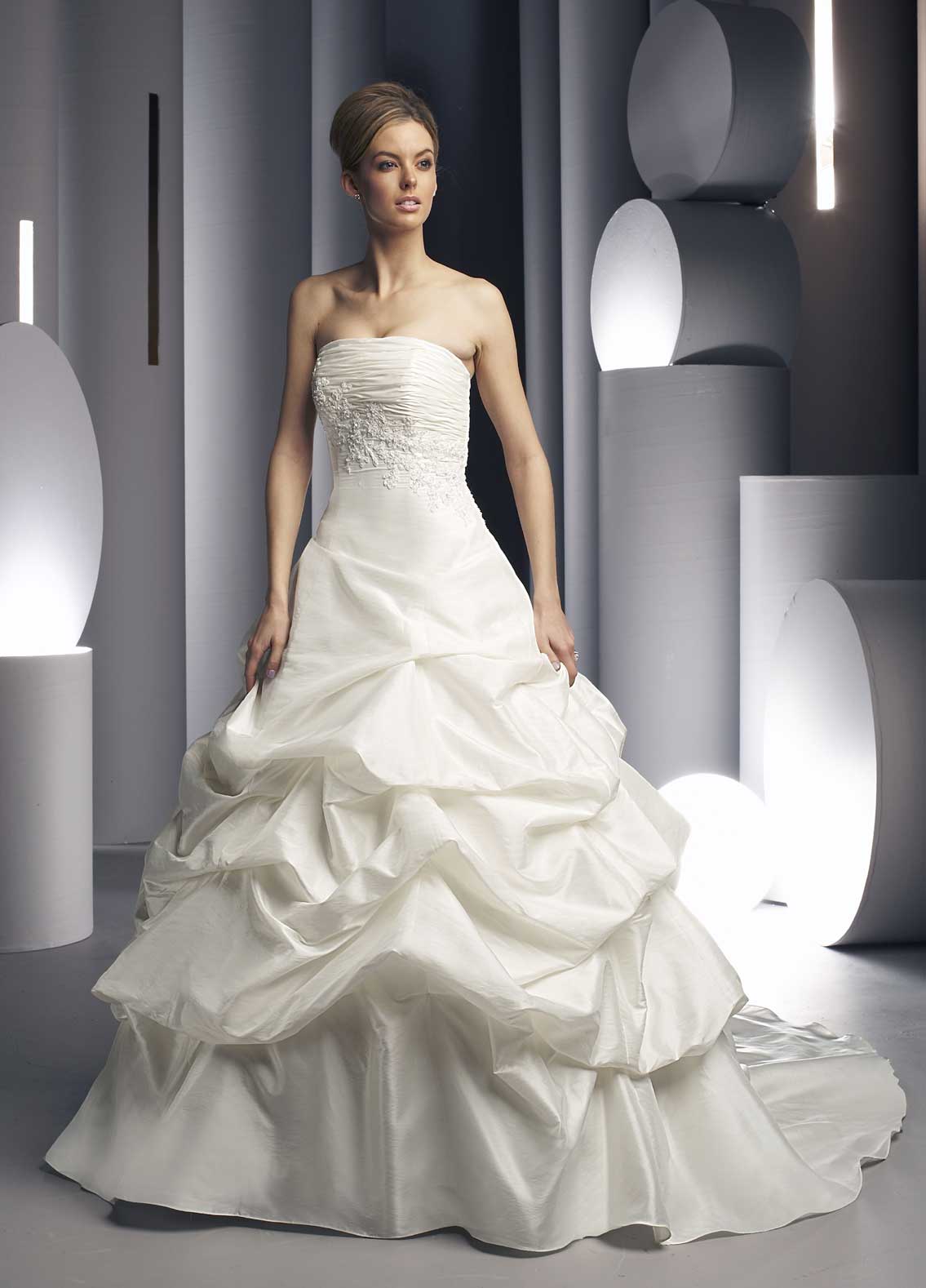Wedding gown with pleated bust-line