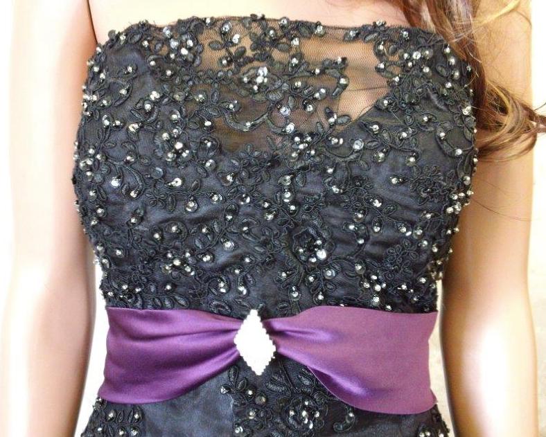 black wedding gown with grape sash