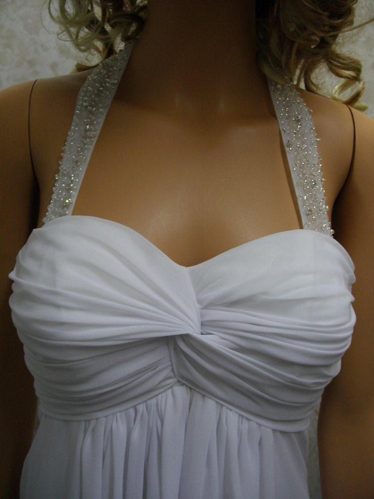 Halter wedding gown with ruched and twisted empire bodice