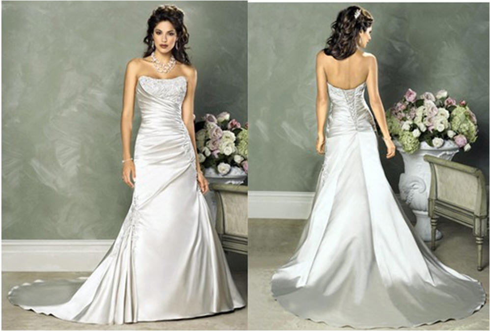 A-line wedding dress with floral applique and ruched bodice