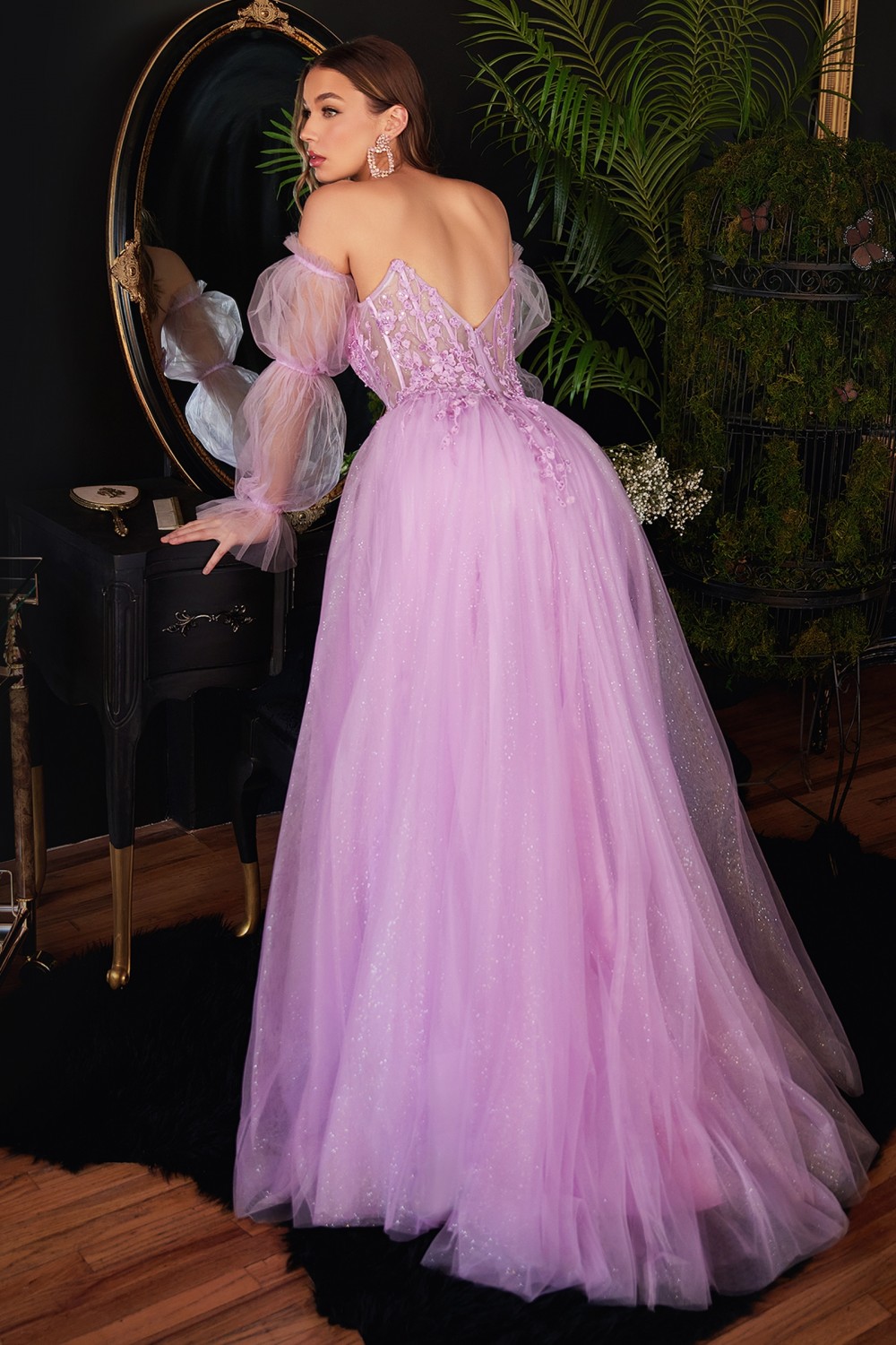 Strapless layered lace tulle gown with removable puff sleeves.