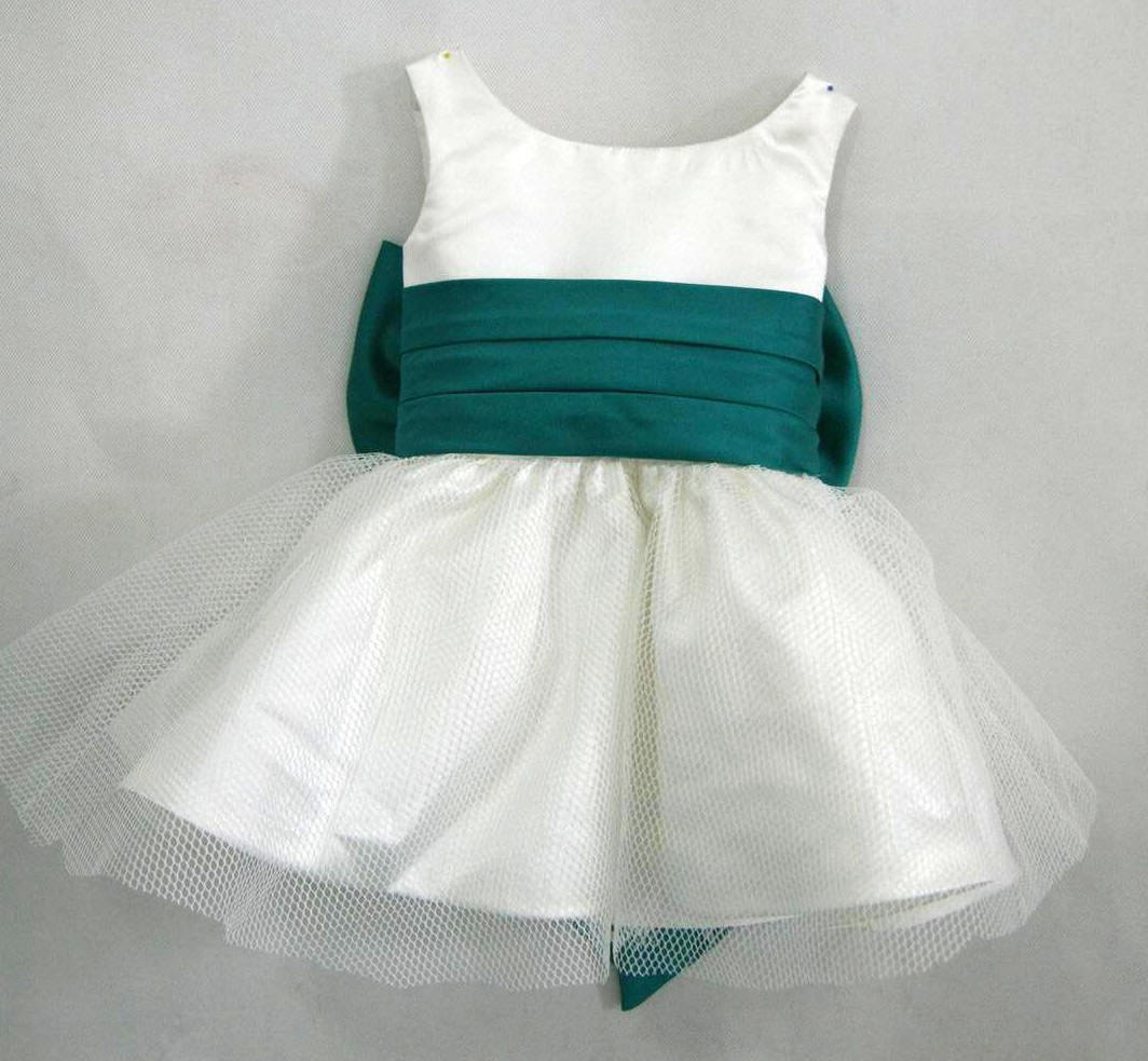 ivory dress with emerald green sash