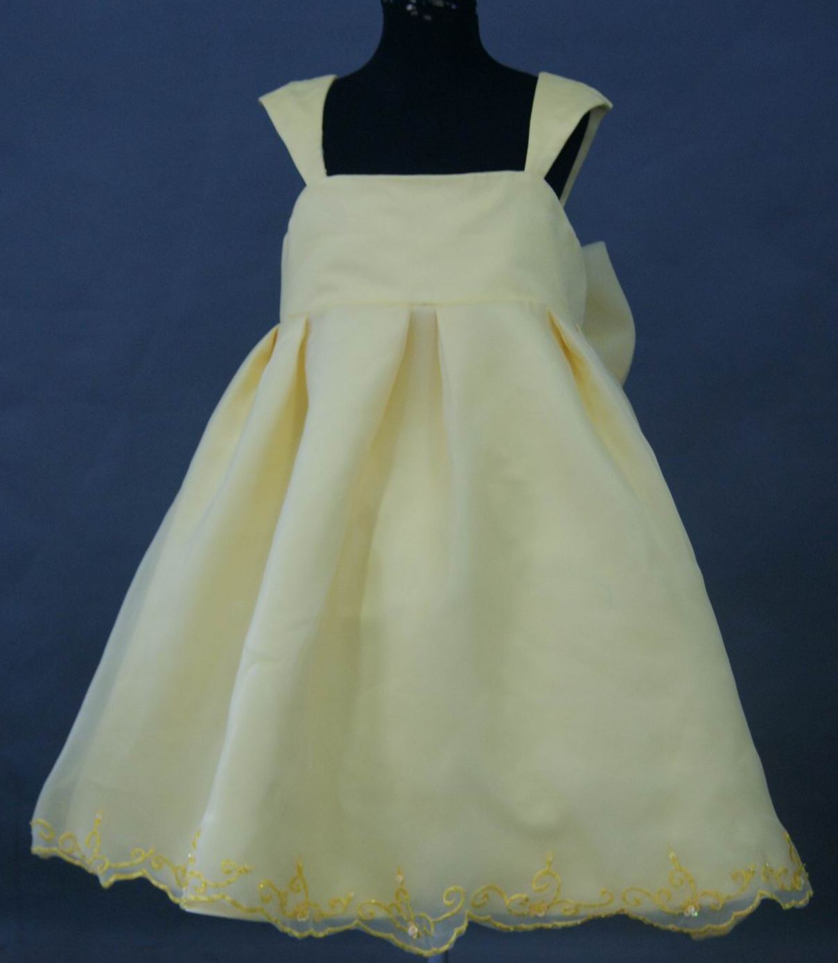 light yellow dress with sunshine embroidery