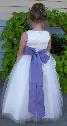 long white flower girl dress with violet sash