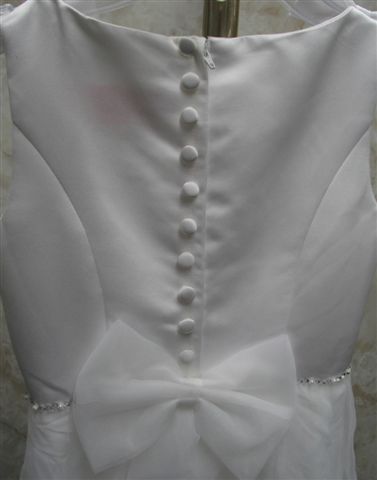 white dress with covered buttons