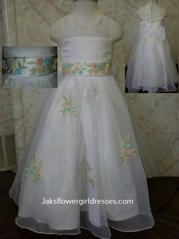sheer neckline with embroidered floral skirt and sash