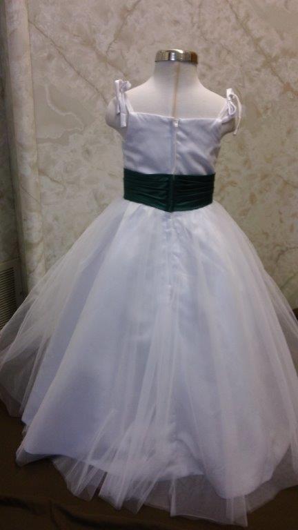white dress with green sash