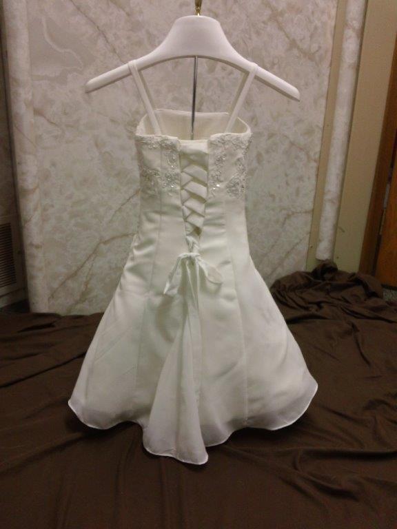 tiny flower girl bride with corset back dress