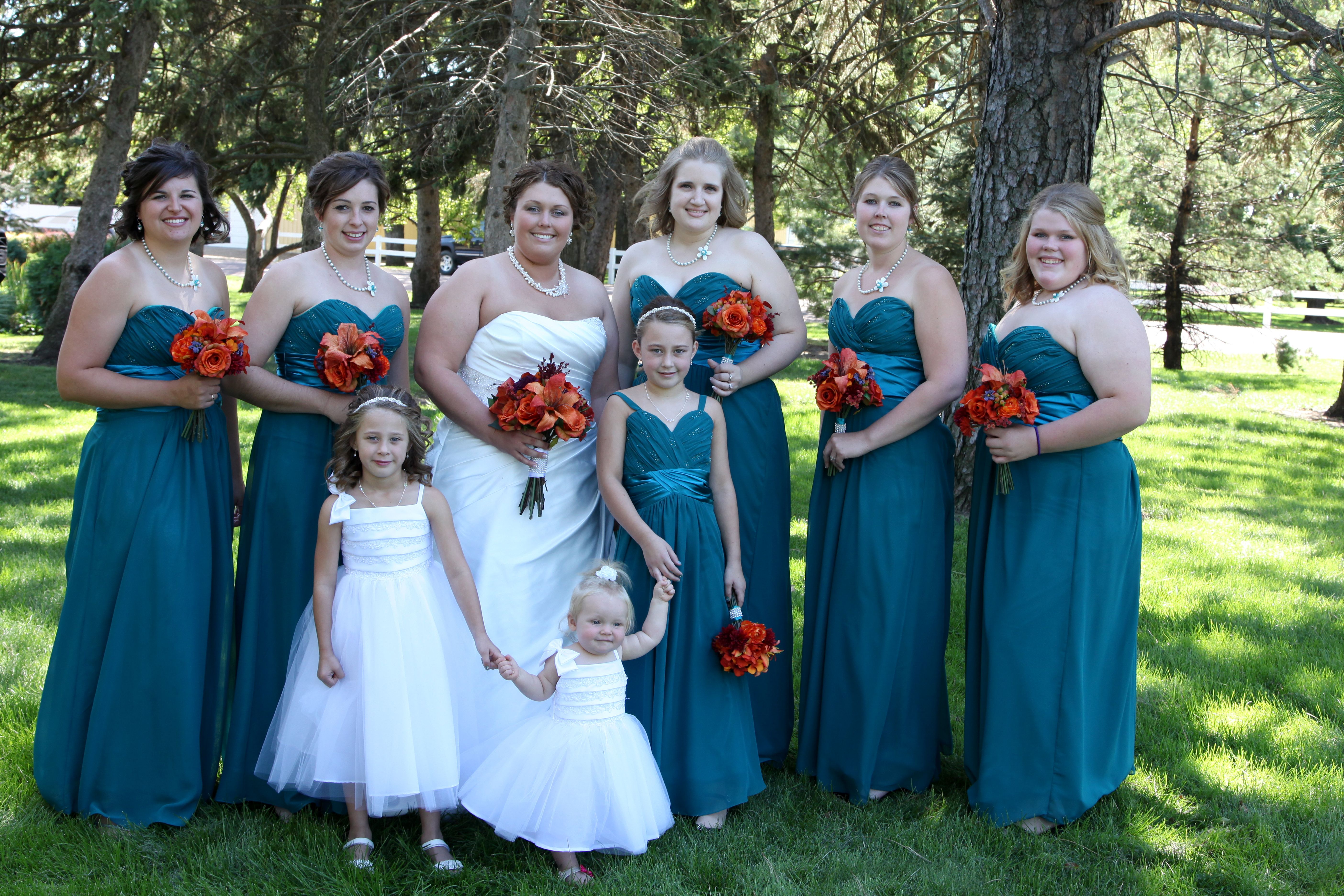 bridesmaids in long teal dresses