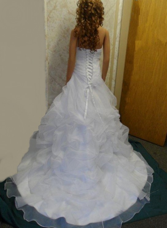 Strapless wedding dress with pickup skirt