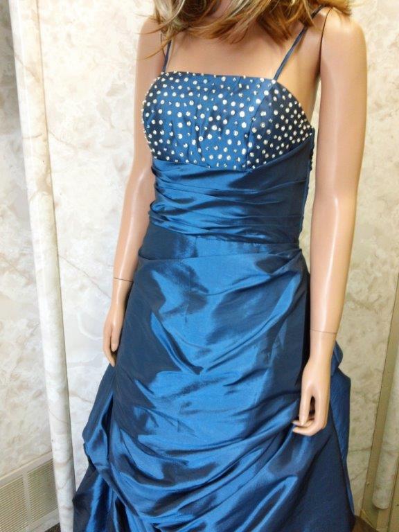 Ocean Blue prom dress has an intricate beaded bodice