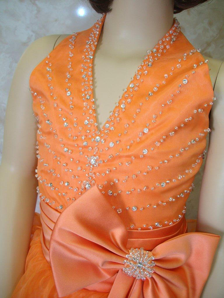  orange halter pageant dress with side bow