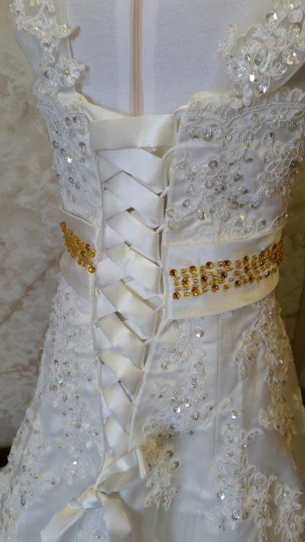 Light ivory flower girl dress with gold beaded sash