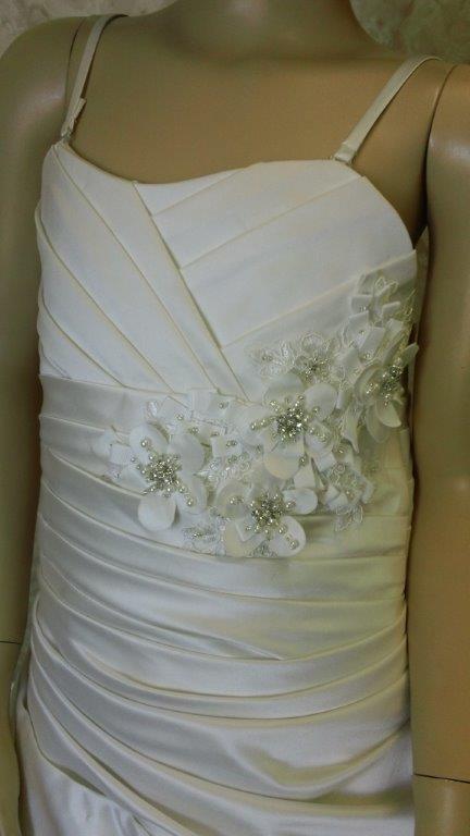 ruched bodice with beaded flower detail