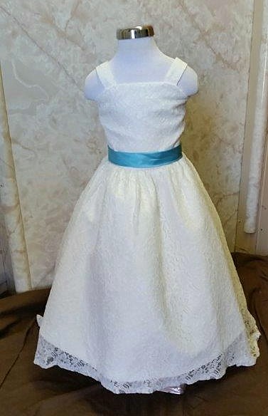 ivory lace dresses with pool blue sash