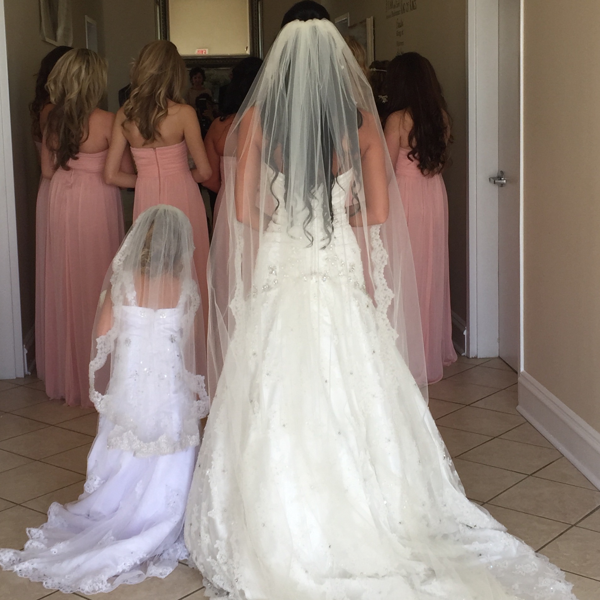 Bride and matching flower girl dresses