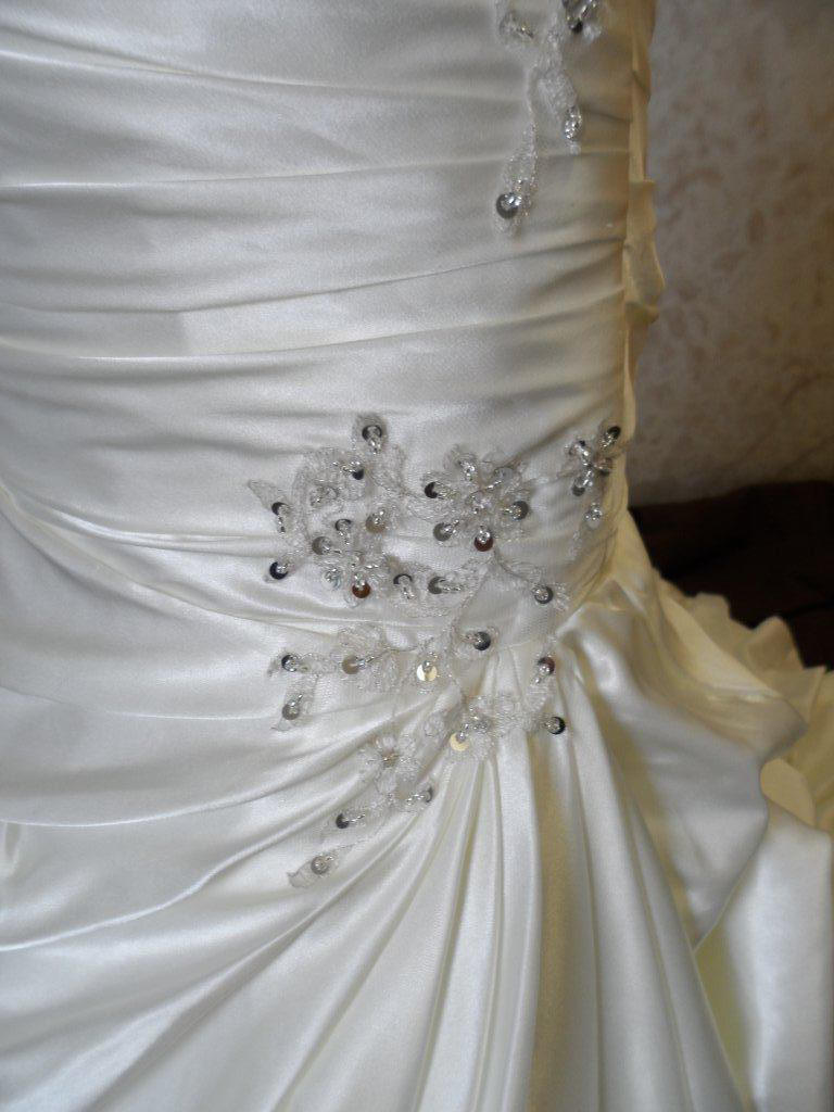 beaded pickup appliques on bubble layered miniature bridal gown