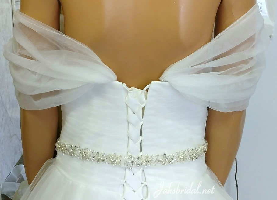 Off shoulder wedding gown with corset back