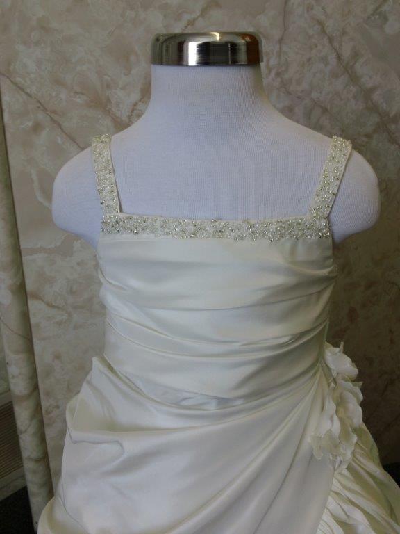 champagne gown with beaded straps and ruched bodice